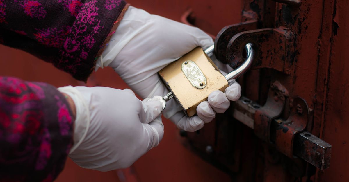 locksmith unlocking front door — Expert Pro Locksmith